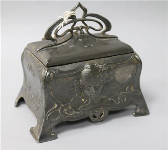 A WMF box with female figurative cartouche